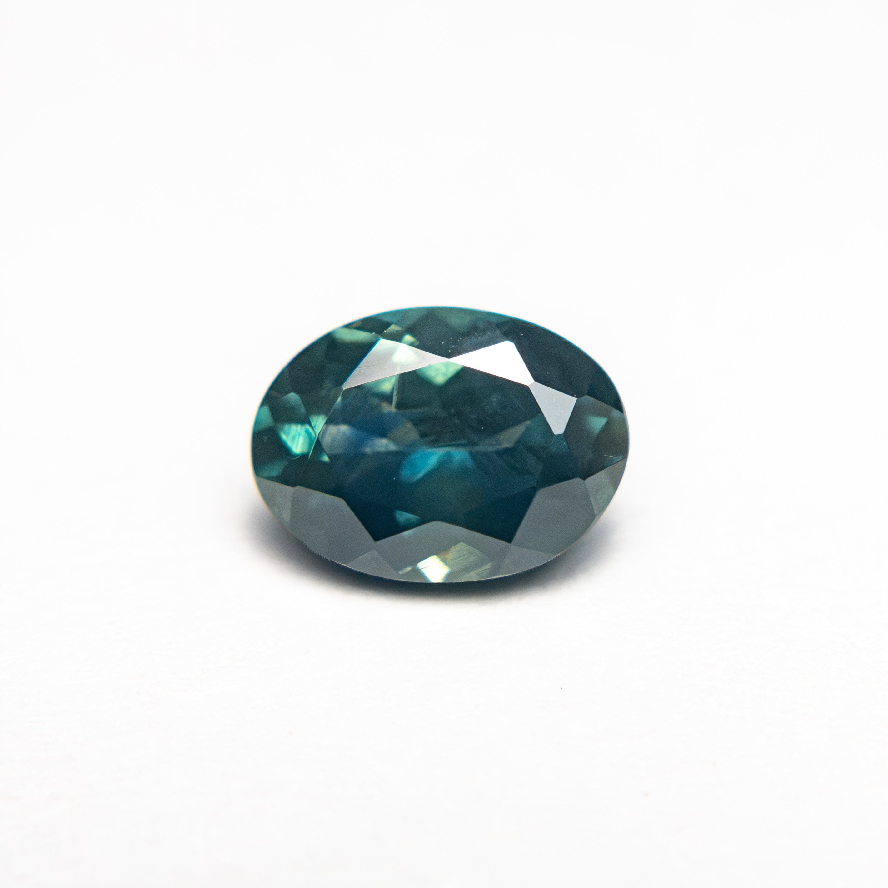 1.33ct 7.59x5.56x3.77mm Oval Brilliant Sapphire 28028-20 - Lelya - bespoke engagement and wedding rings made in Scotland, UK