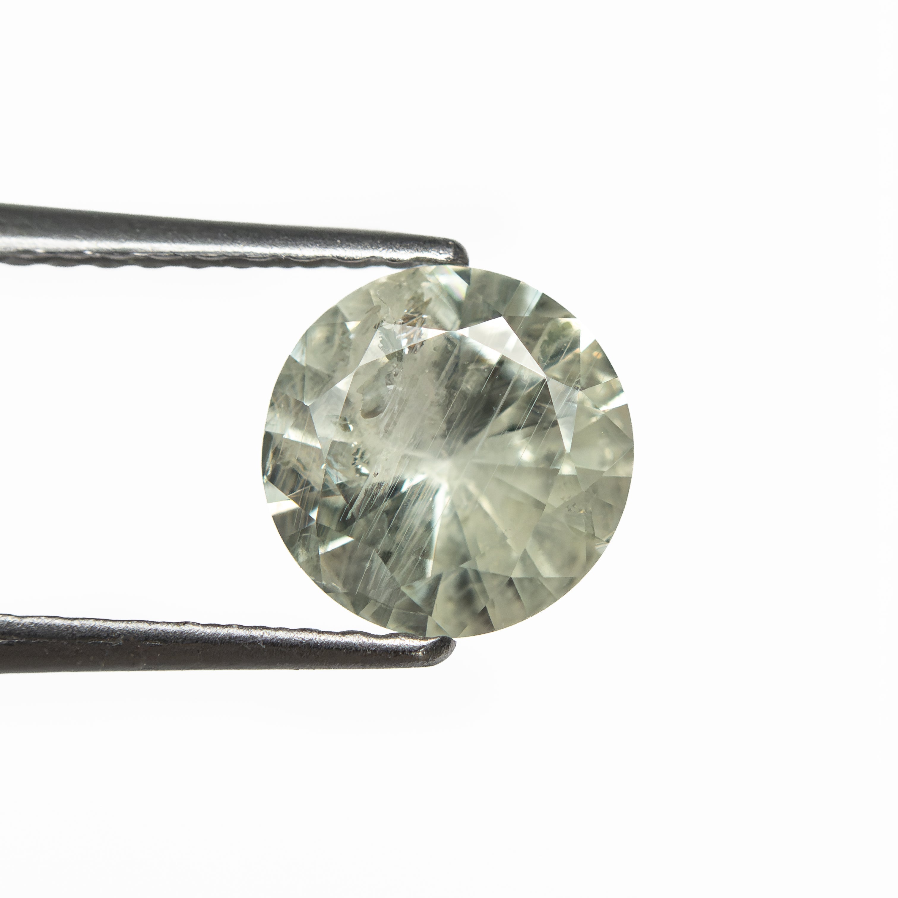 1.37ct 6.85x6.81x4.18mm Round Brilliant Sapphire 26142-01 - Lelya - bespoke engagement and wedding rings made in Scotland, UK