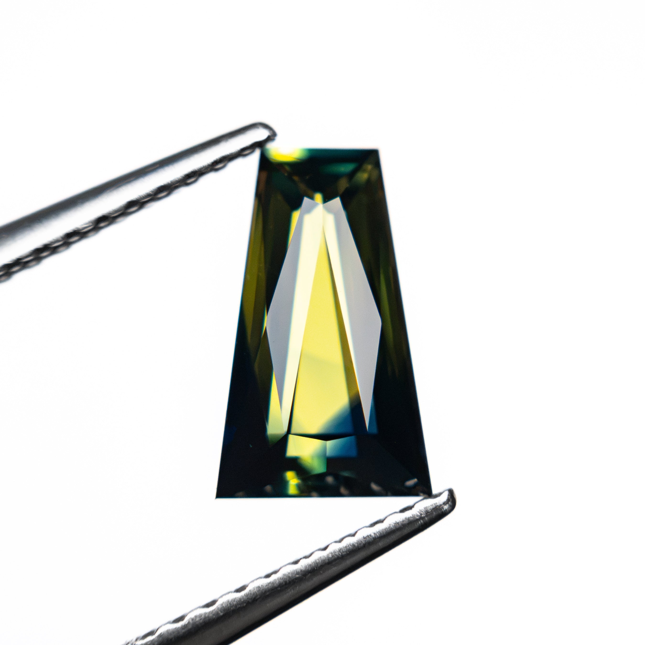 1.46ct 9.30x5.64x2.89mm Trapezoid Brilliant Sapphire 27766-05 - Lelya - bespoke engagement and wedding rings made in Scotland, UK