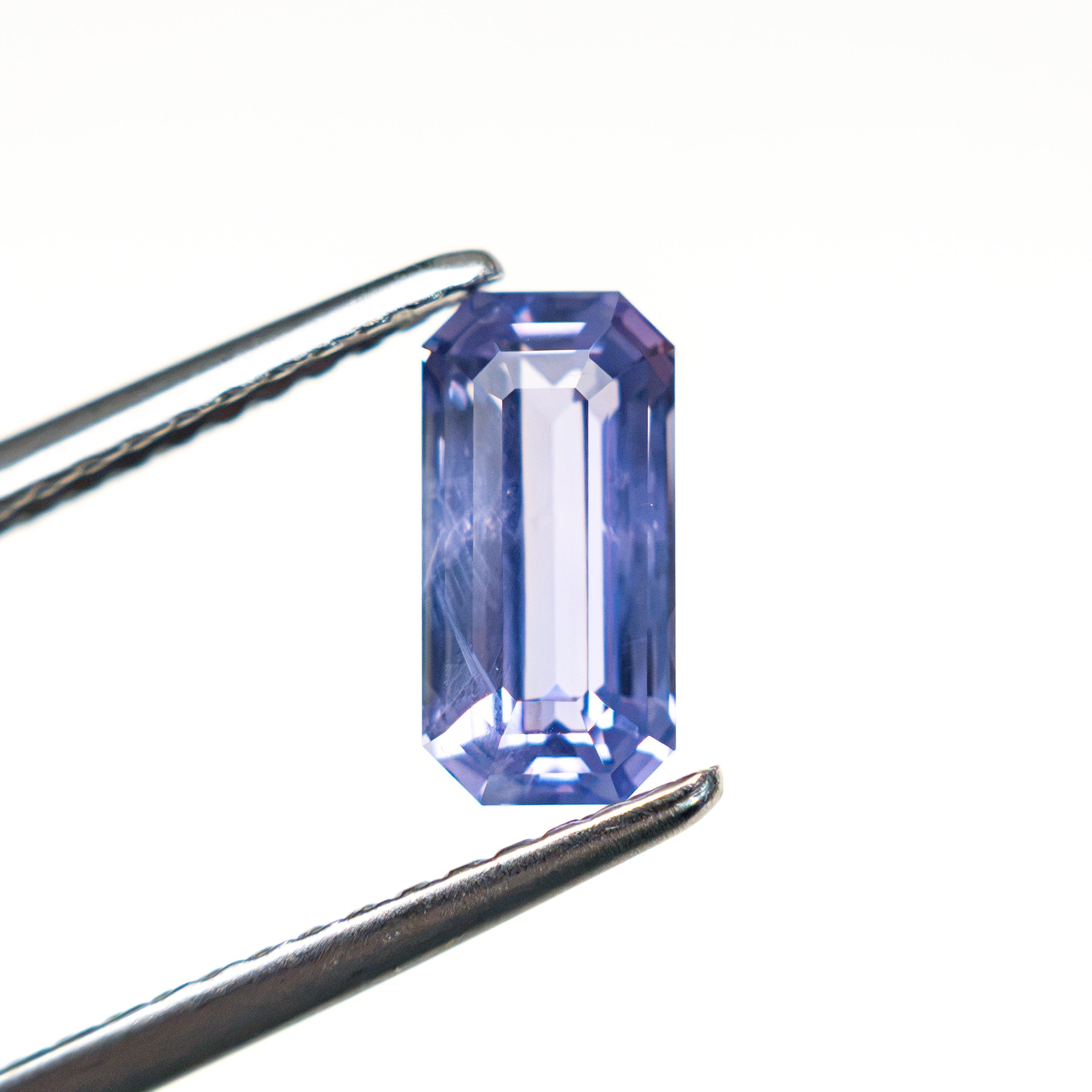 1.51ct 8.36x4.13x3.67mm Cut Corner Rectangle Step Cut Sapphire 28259-01 - Lelya - bespoke engagement and wedding rings made in Scotland, UK