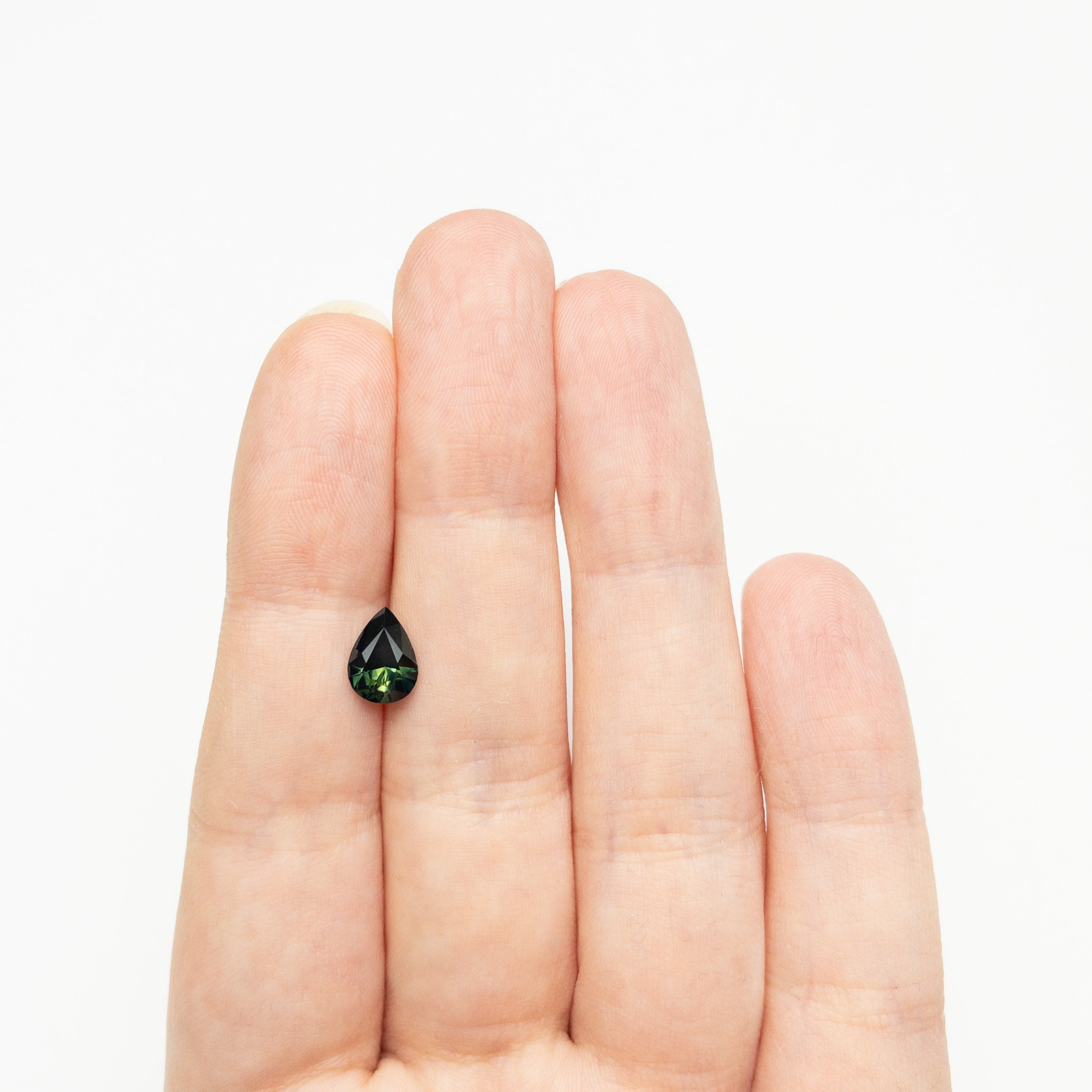 1.54ct 8.68x6.29x4.28mm Pear Brilliant Sapphire 27357 - 01 - Lelya - bespoke engagement and wedding rings made in Scotland, UK