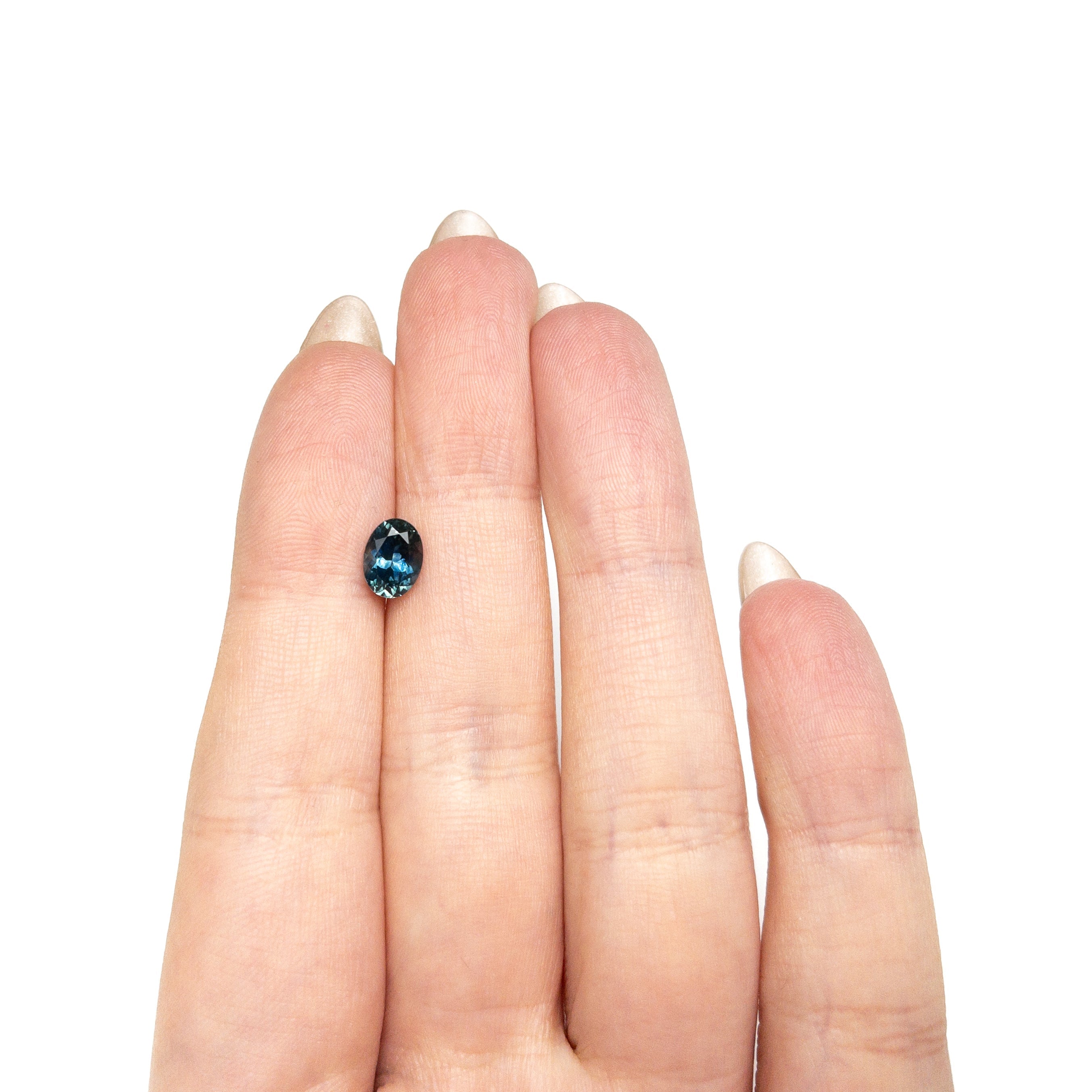 1.58ct 7.58x5.62x4.42mm Oval Brilliant Sapphire 28028-29 - Lelya - bespoke engagement and wedding rings made in Scotland, UK