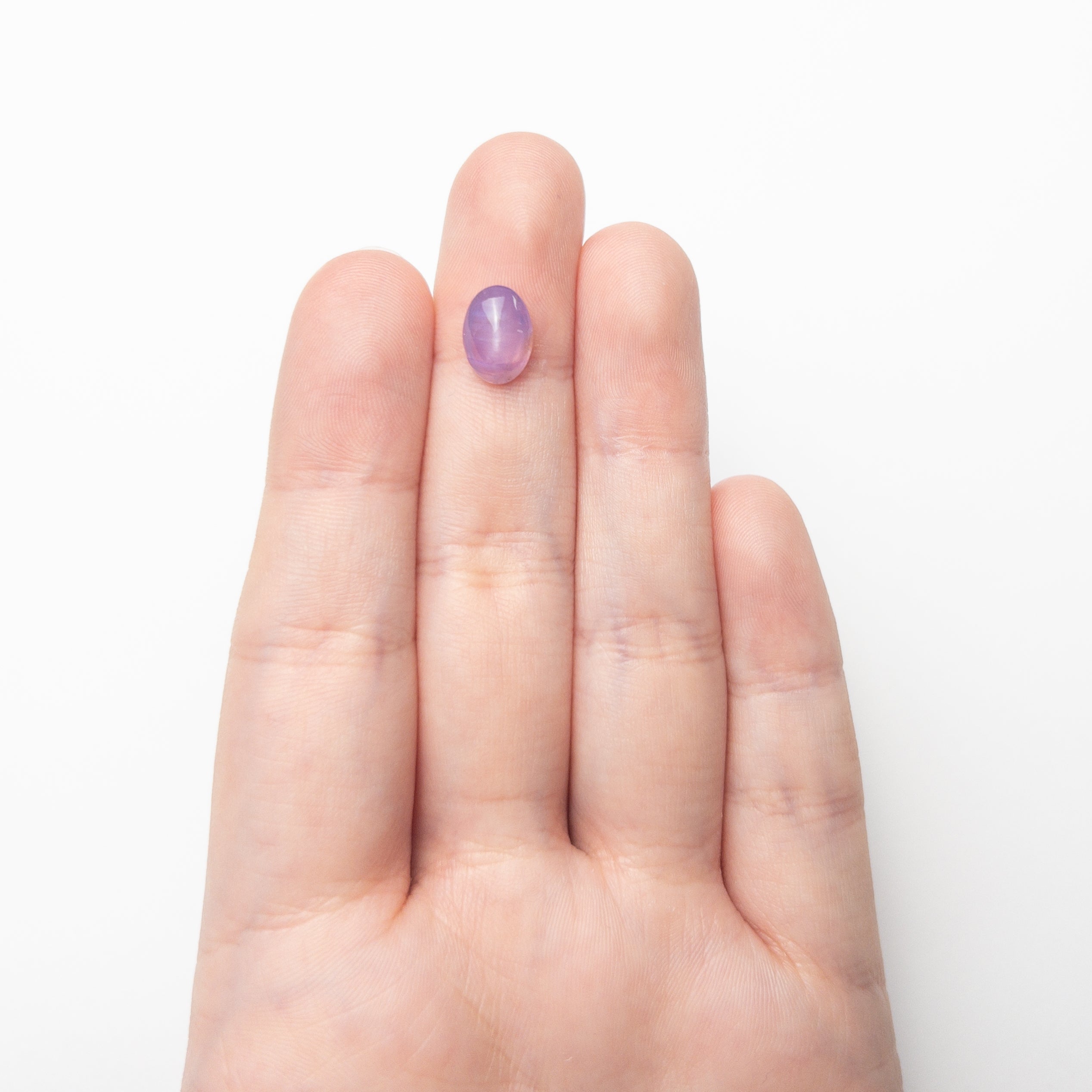 3.32ct 10.38x7.30x5.08mm Oval Sugarloaf Cabochon Sapphire 28218-01 - Lelya - bespoke engagement and wedding rings made in Scotland, UK