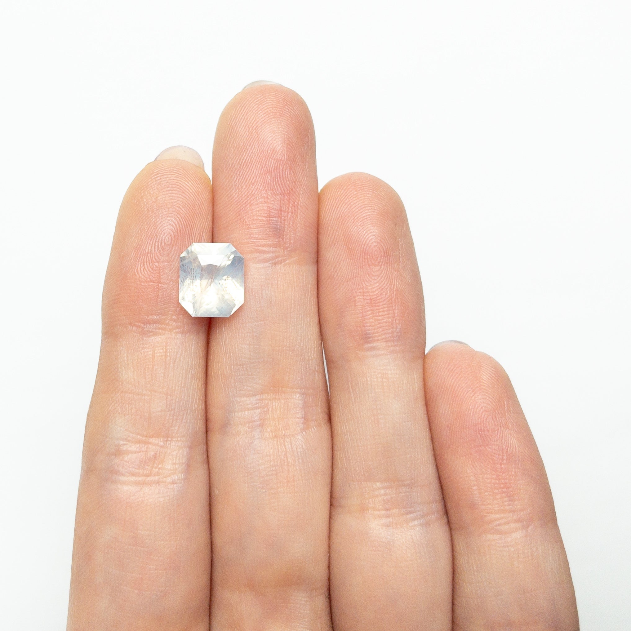 4.08ct 9.26x8.22x5.71mm Cut Corner Rectangle Step Cut Sapphire 27214 - 01 - Lelya - bespoke engagement and wedding rings made in Scotland, UK