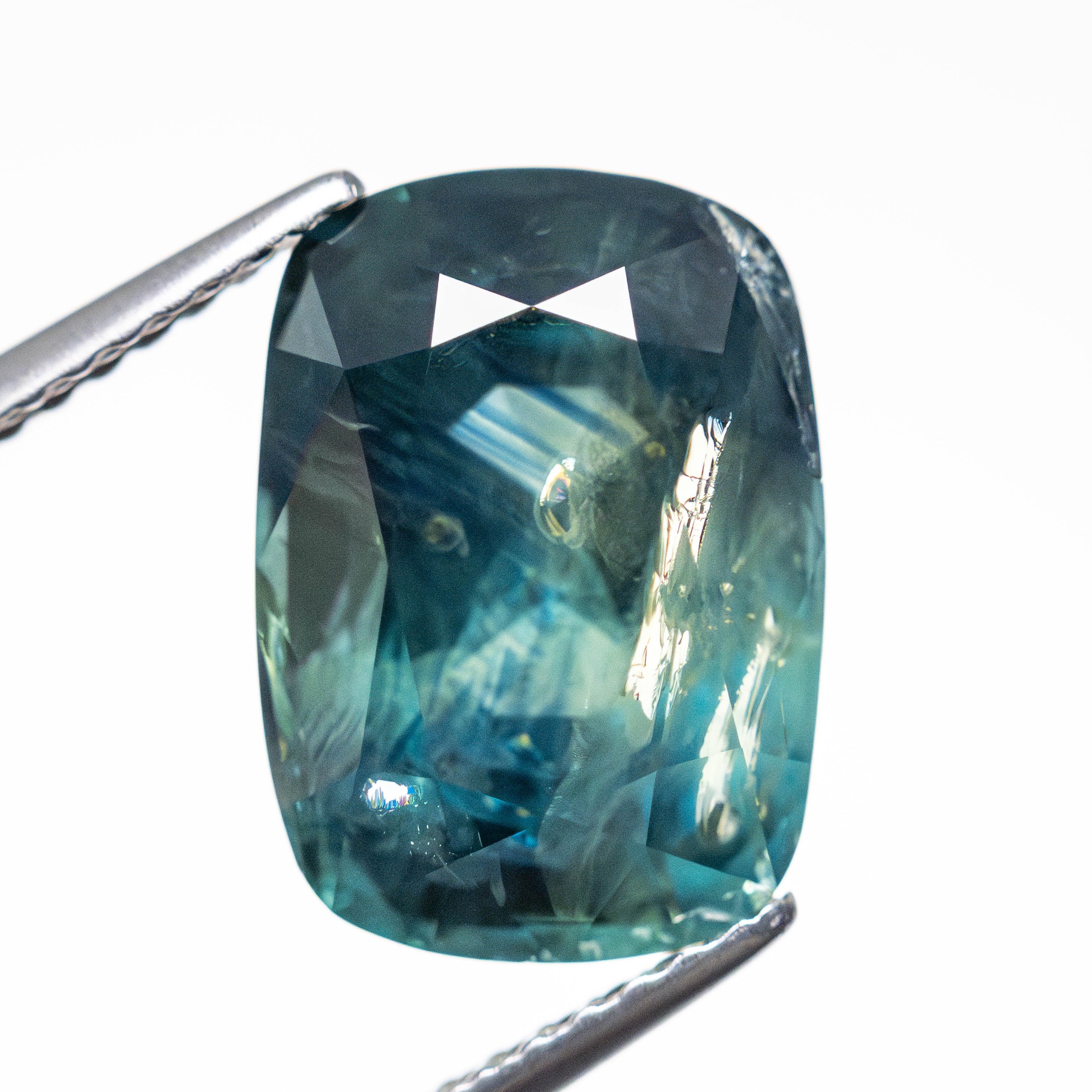 6.44ct Teal Blue Nebula Cushion Brilliant Sapphire - Lelya - bespoke engagement and wedding rings made in Scotland, UK