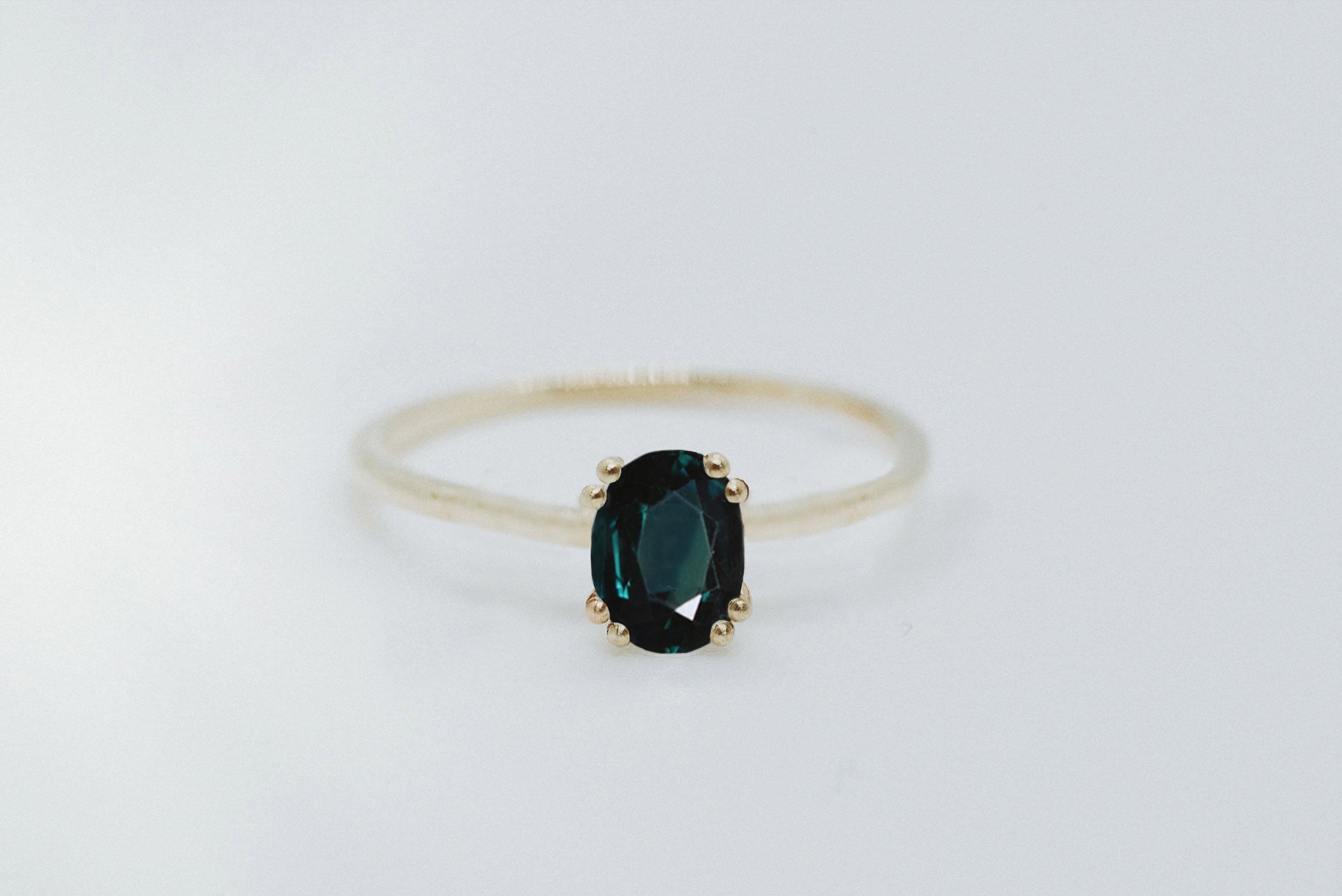 Oval Cut 1.2ct Dark Teal Sapphire - Lelya - bespoke engagement and wedding rings made in Scotland, UK