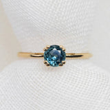Round Brilliant Cut 0.61ct Blue Montana Sapphire - Lelya - bespoke engagement and wedding rings made in Scotland, UK