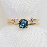 Round Brilliant Cut 0.61ct Blue Montana Sapphire - Lelya - bespoke engagement and wedding rings made in Scotland, UK