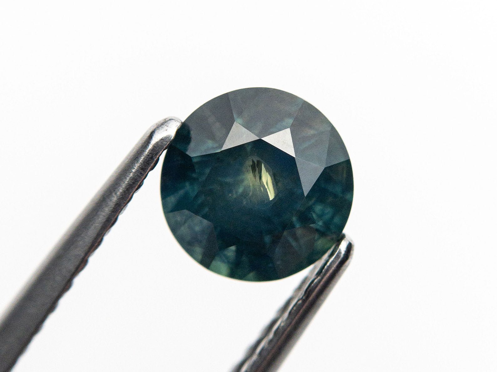 Round Brilliant Cut 1.07ct Teal Montana Sapphire - Lelya - bespoke engagement and wedding rings made in Scotland, UK